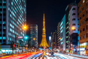 Traffic and Tokyo cityscape at night, Japan.